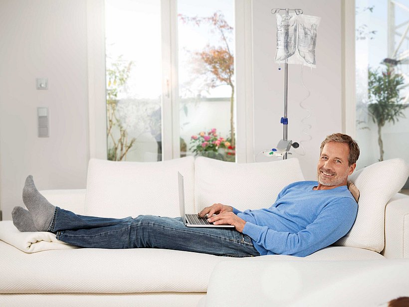 CAPD - man relaxing on a sofa