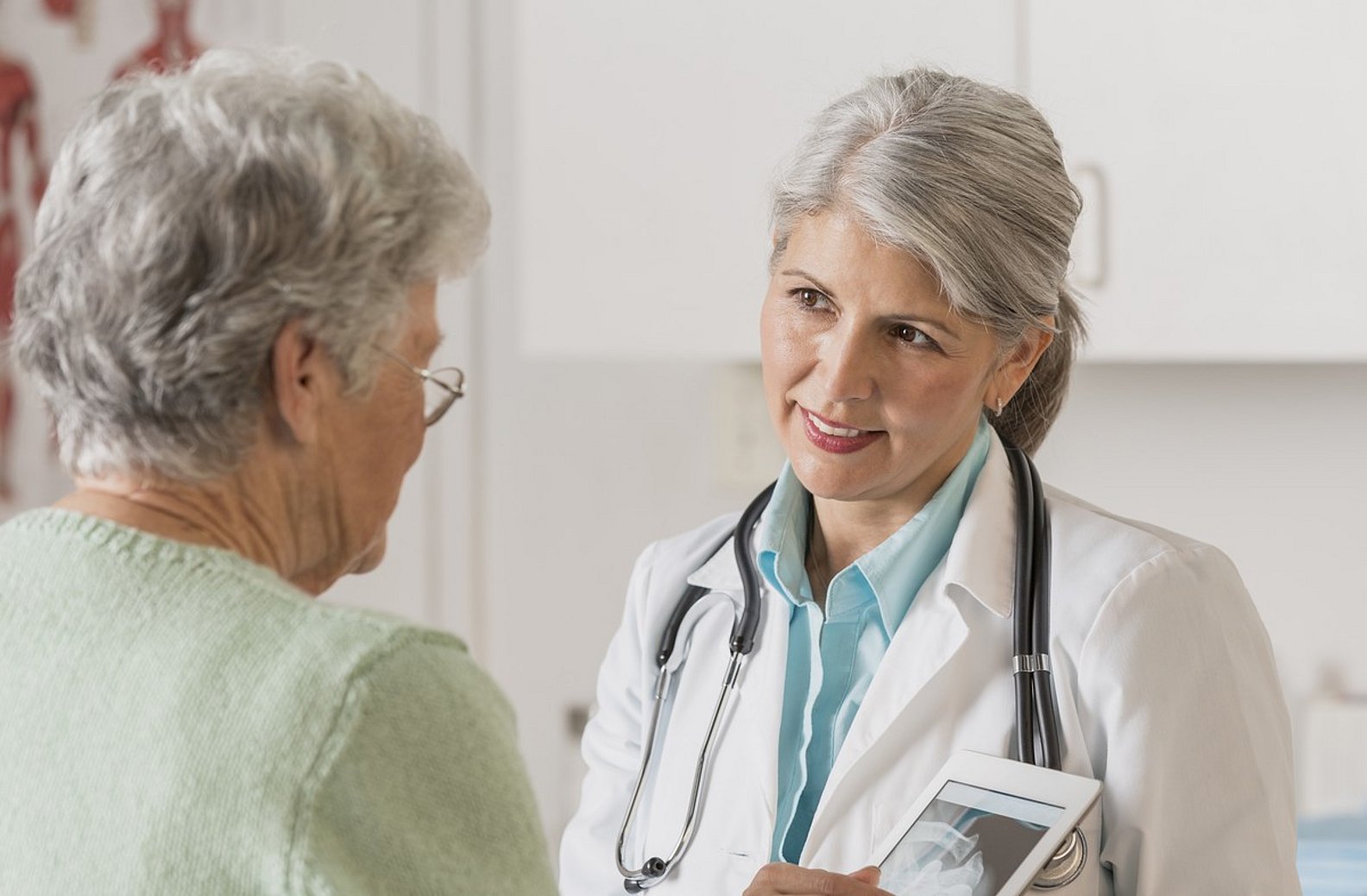 Doctor talking to patient