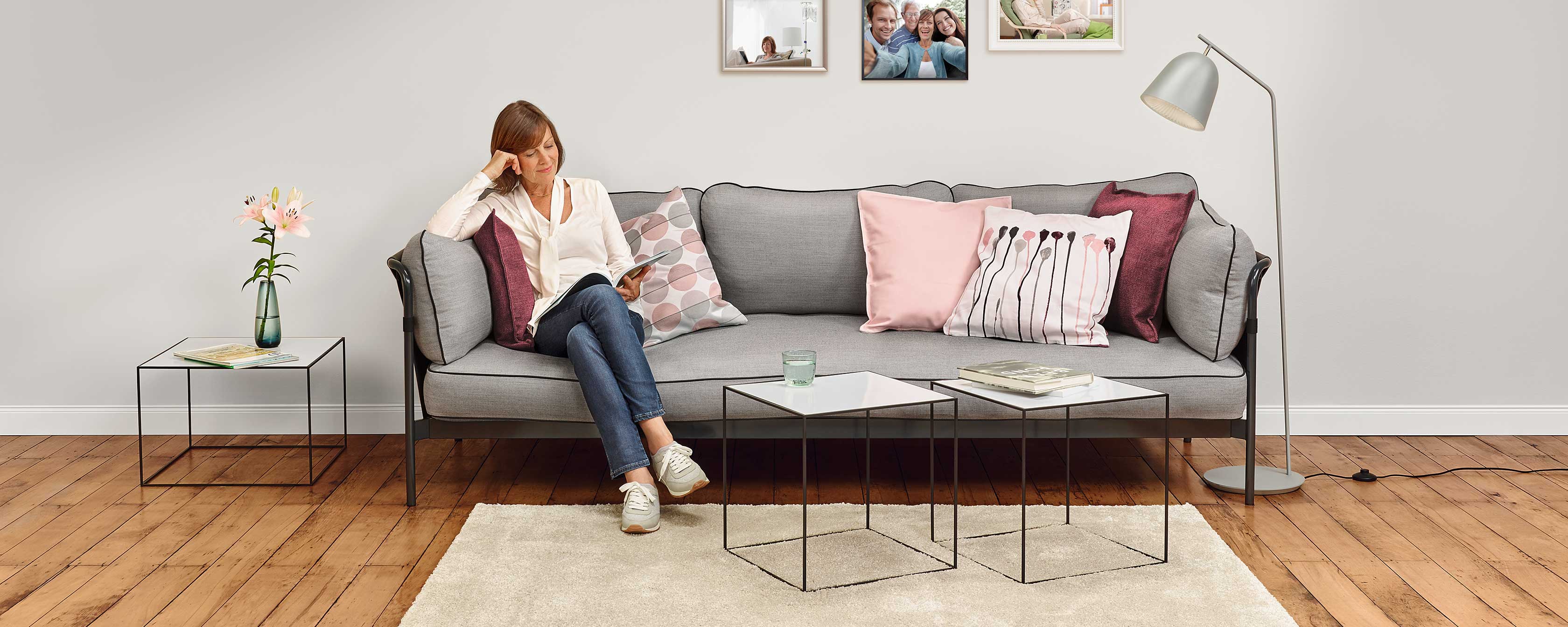 Woman sitting on a sofa